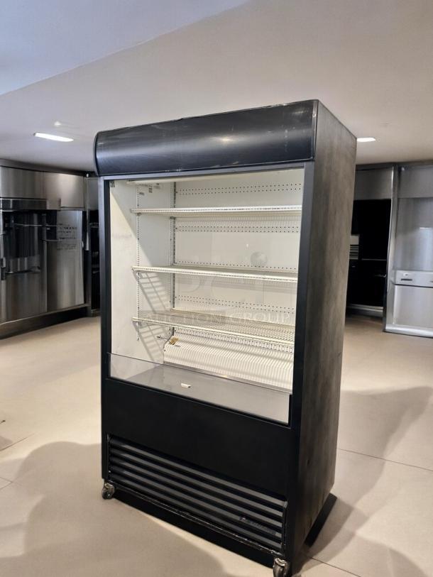 True TAC-48 air curtain merchandiser, excellent condition, 208/230V, fully tested, shelves intact.