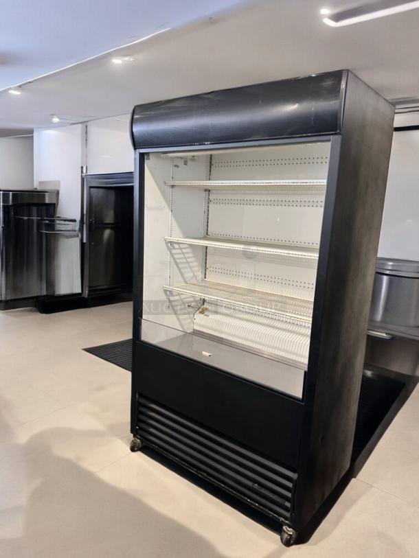 Excellent condition True TAC-48 air curtain merchandiser, 208/230V, fully tested and operational.