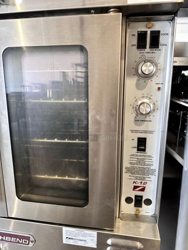 Southbend KLG/27SC double deck convection oven, natural gas, excellent condition, view of control panel and glass door.