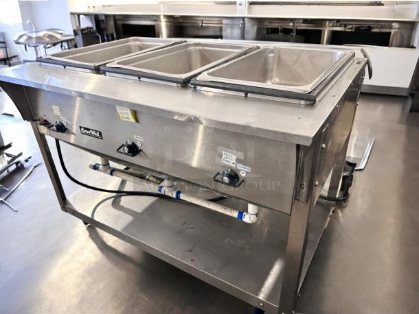 Vollrath ServeWell 387013, 3-well steam table in excellent condition. Fully tested, 120V. Durable with visible controls.