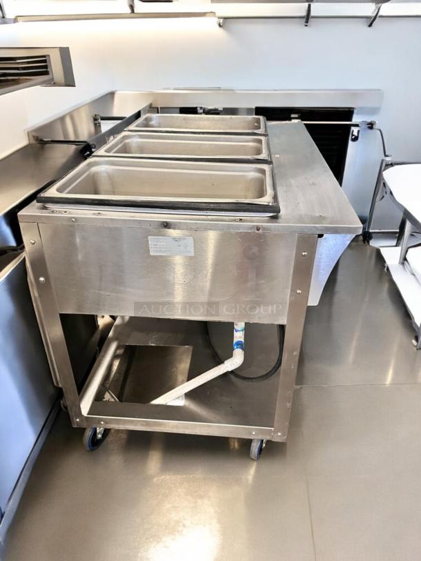 Vollrath ServeWell 387013, 3-well steam table in excellent condition, 120V, fully tested, stainless steel, casters.