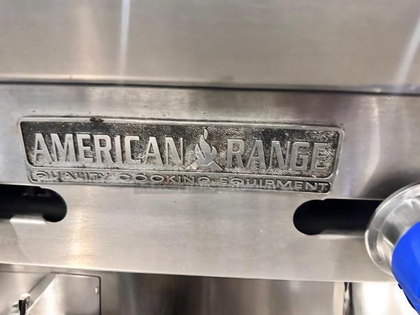 American Range heavy-duty 36" gas griddle, excellent condition, manual controls, fully tested, brand label visible.