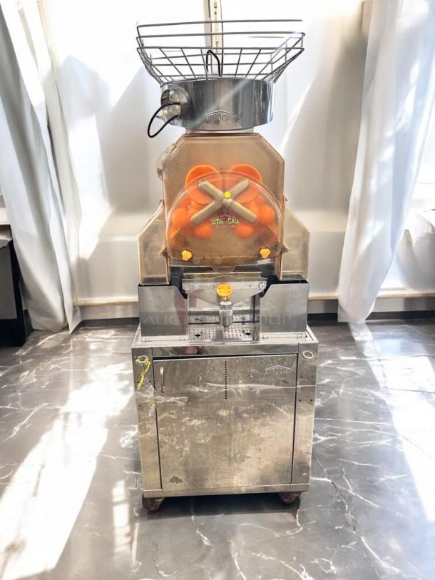 Citrocasa 8000SB commercial citrus juicer in excellent condition, 115V, fully tested and working, stainless steel finish.