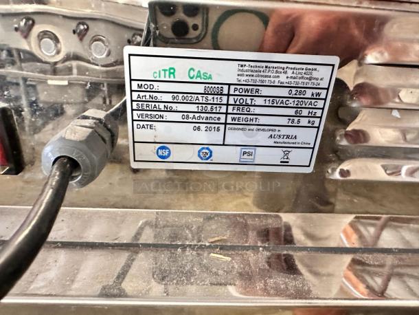 Commercial Citrocasa 8000SB Citrus Juicer, excellent condition, 115V, fully tested. Label shows model, power, serial number.