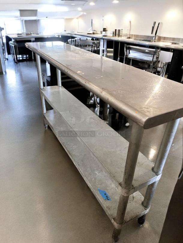 Stainless steel work table, 60" x 18", with 2 undershelves, in excellent condition, fully tested and operational.