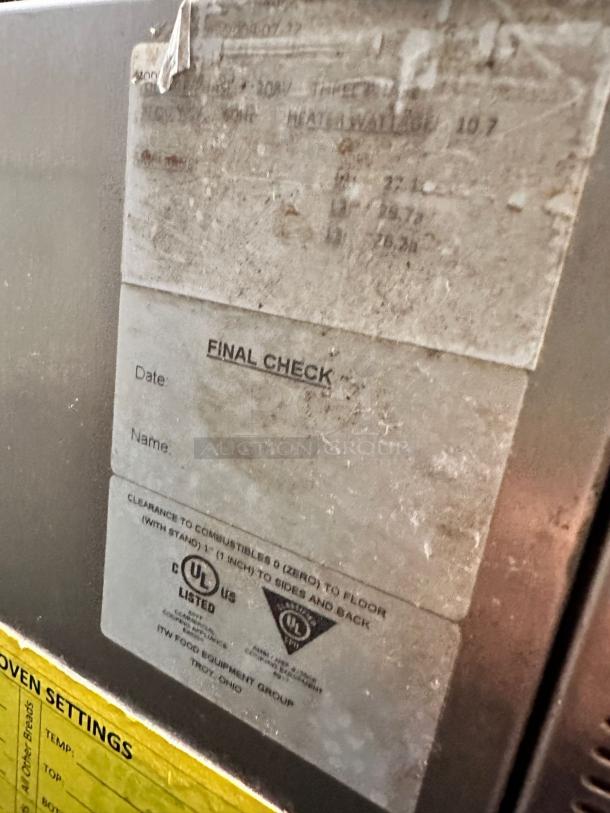 Middleby Marshall HWDO3D-4 pizza oven label with UL safety certifications, clearance instructions, and final quality check notice.