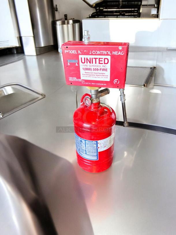 PyroChem PCL-160 Kitchen Knight II Fire Suppression System in excellent condition. Red control box visible with service label.