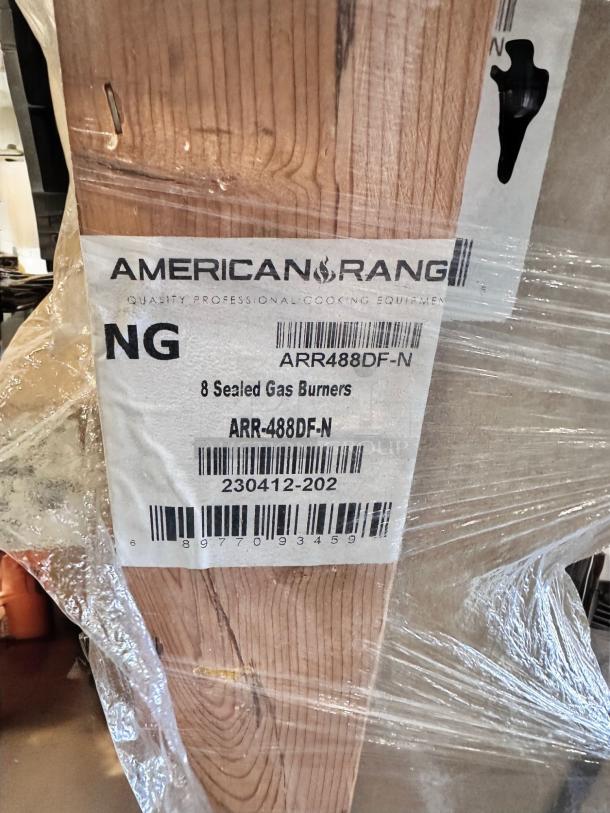 Brand new American Range ARR-488DF-N with 8 sealed gas burners, natural gas, in original crate with label visible.