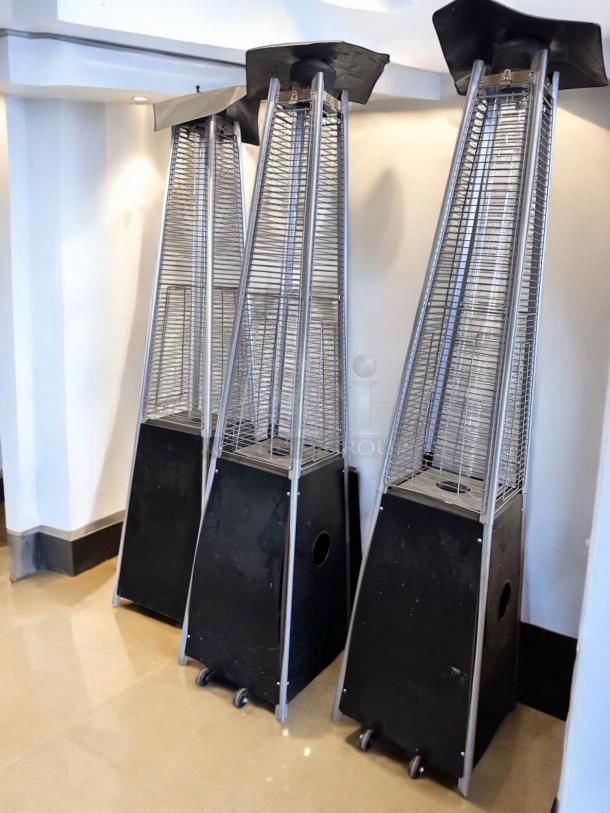 Three Foowin Outdoor Patio Heaters, 48,000 BTU, models CAPH-GT-S-MOCHA, SB, HB, excellent condition, fully tested, on wheels.
