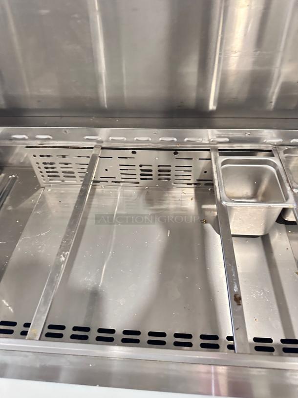 Turbo Air MST-48-N sandwich prep table in excellent condition, two doors, with overshelf, stainless steel, 115V, fully tested.