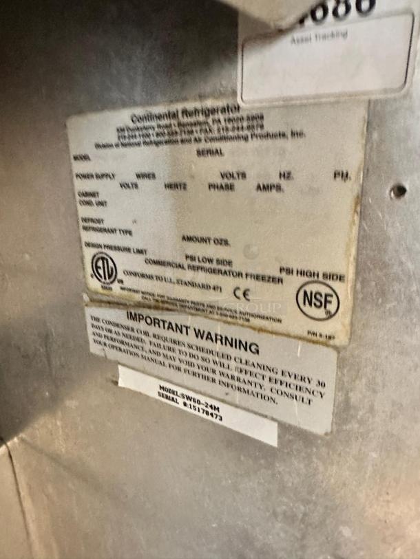 Continental Refrigerator SW60-24M plate showing model and serial number. NSF and ETL certified, with maintenance warning.