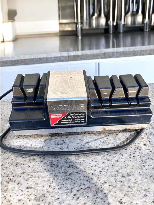 Waring WKS800 professional electric knife sharpener, 120V, excellent condition, fully tested, with distinct coarse and fine sharpening slots.