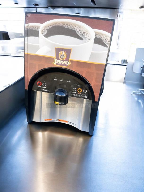 Javo Hot Beverage Dispenser in excellent condition, 120V, fully tested. Sleek design with control panel and Javo branding.