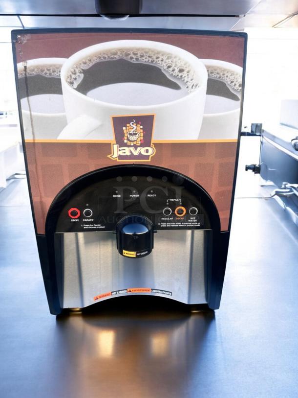 Javo Hot Beverage Dispenser, excellent condition, 120V, fully tested. Features stop, carafe, and hot water buttons.