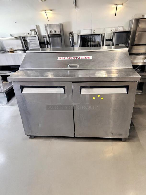 Turbo Air TST-48SD, 48" sandwich/salad prep table, excellent condition, stainless steel, labeled "Salad Station," 115V, fully tested.