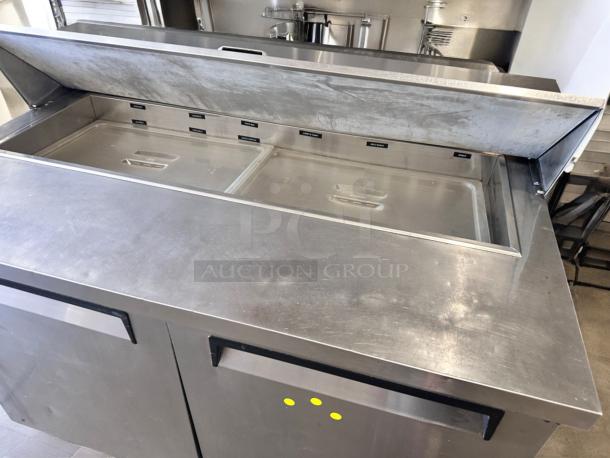 Turbo Air TST-48SD 48" sandwich prep table in excellent condition, stainless steel, tested and fully functional, 115V.