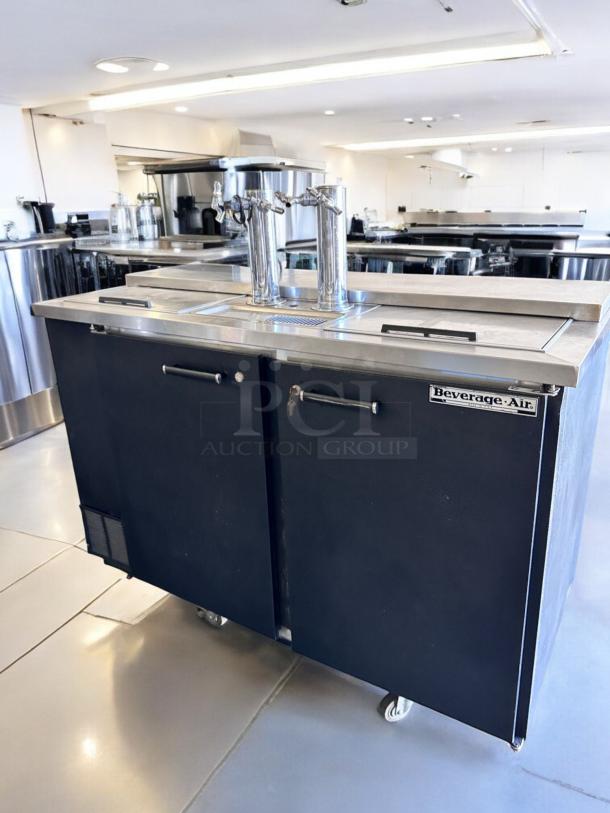 Excellent condition Beverage-Air DD58BC draft beer dispenser, 2 kegs capacity, 115V, fully tested, dual taps, on casters.