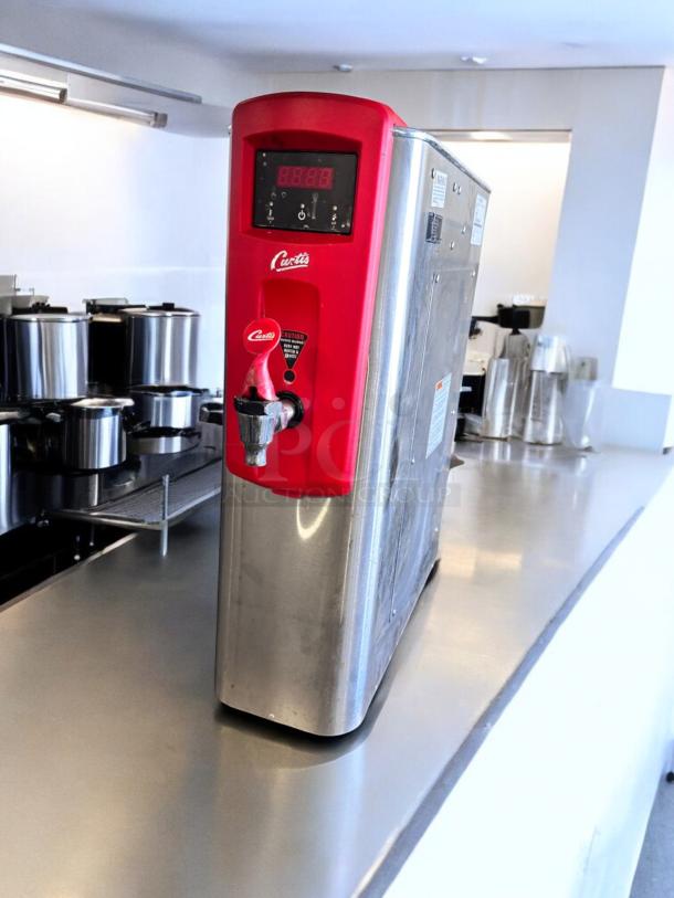 Curtis WB5N digital hot water dispenser, 120V, excellent condition, stainless steel, red accent, fully tested and working.