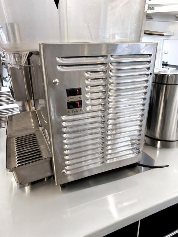 Crathco D25-3 dual bowl cold beverage dispenser in excellent condition, 115V, fully tested and working, side view.