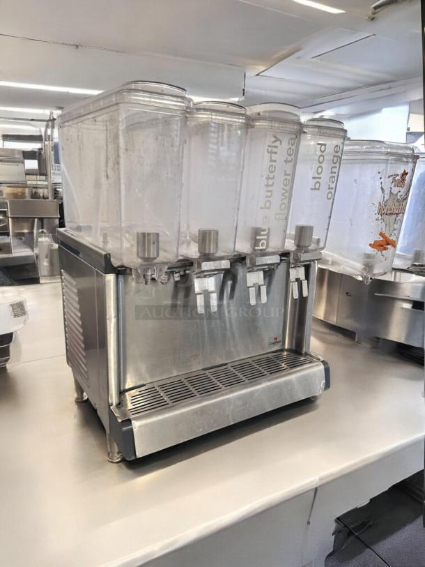 Crathco CS-4E-2/3D-16 triple bowl cold beverage dispenser, excellent condition, fully tested, 120V, with labeled bowls.