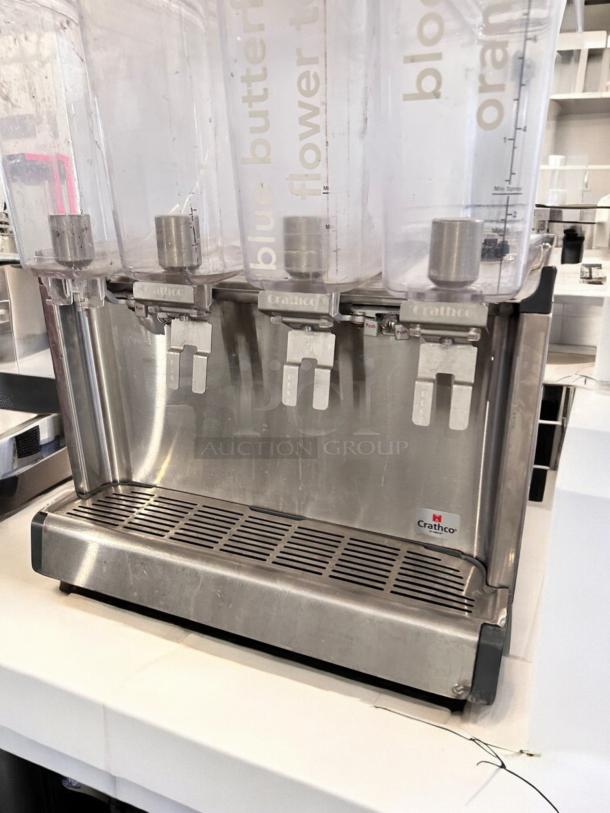 Crathco CS-4E-2/3D-16 triple bowl cold beverage dispenser, excellent condition, 120V, fully tested, stainless steel design.