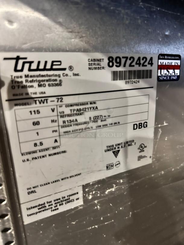 True TWT-72 worktop refrigerator label showing model, voltage, refrigerant type, and certification details.