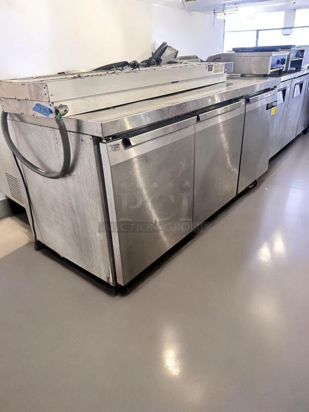 Continental SW72-AS-BS 72" stainless steel worktop refrigerator. Excellent condition, fully tested, 115V, three doors.