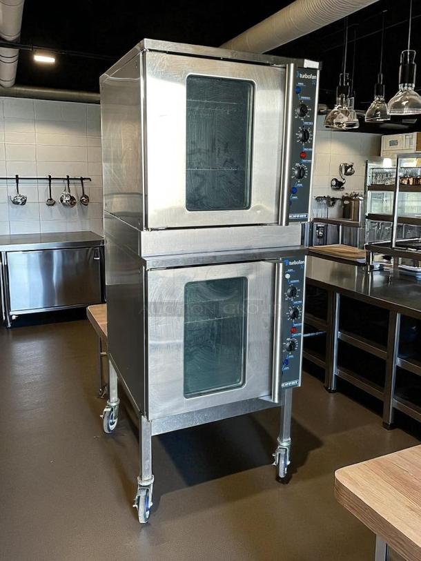 Double stacked Moffat Turbofan E32MS/2 convection ovens, stainless steel, fully tested, working, on casters for mobility.