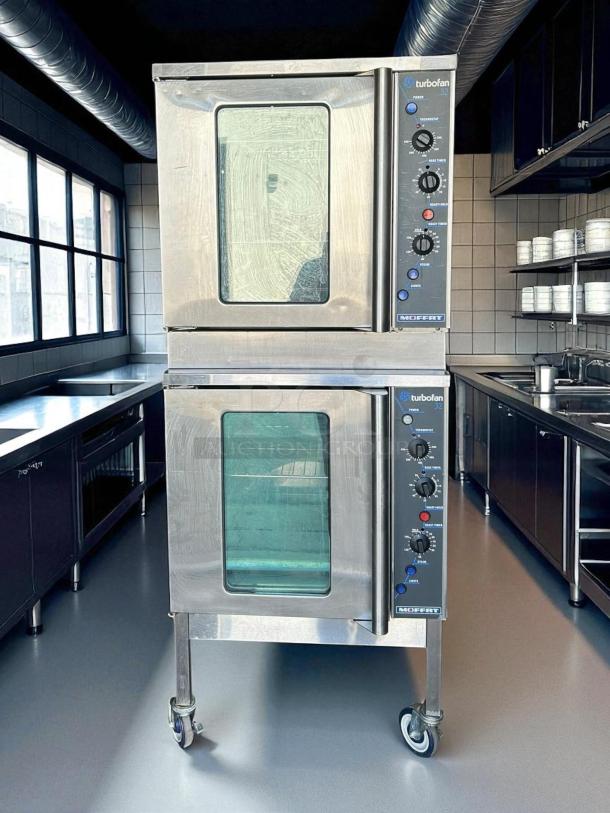 Double stacked Moffat Turbofan E32MS/2 electric convection ovens on wheels, stainless steel, fully tested and working.