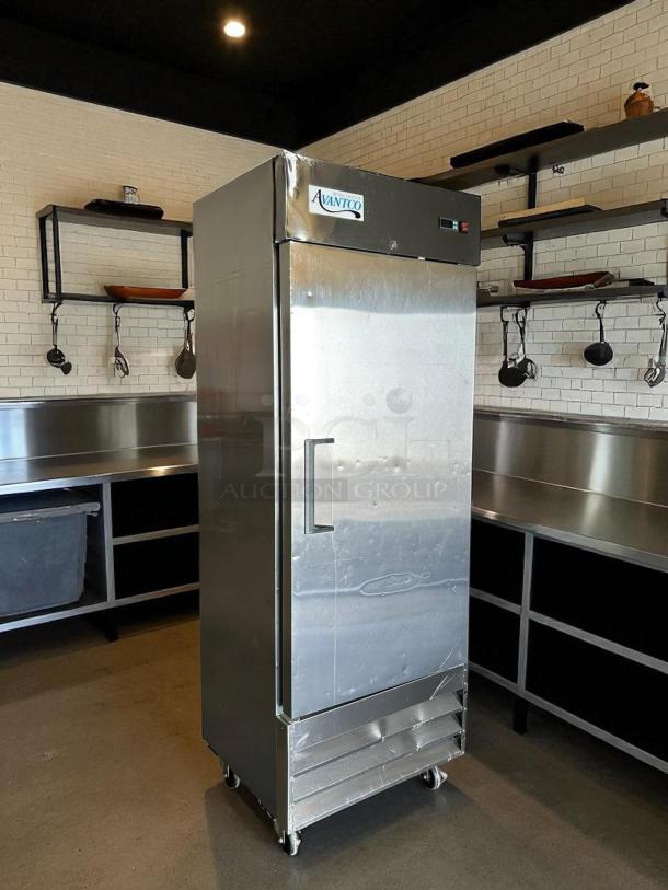 Avantco A-19F-HC 29" solid door reach-in freezer in stainless steel, fully tested, excellent condition, on casters.