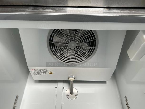 Avantco A-19F-HC 29" solid door reach-in freezer, interior fan view, fully tested condition, white interior.