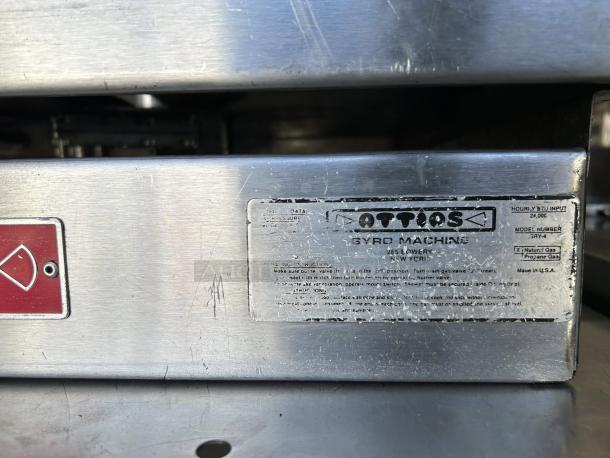 Attias GRY-4 Gyro Machine, 4 burners, 1 spit, great condition, tested and working. Visible label with specifications.