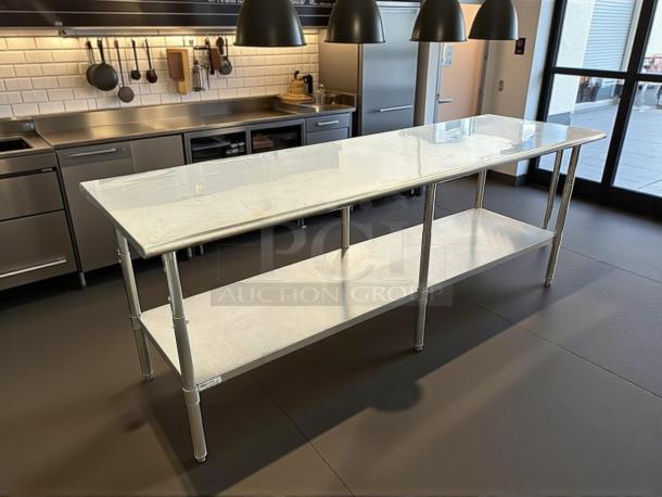 Uline Stainless Steel Worktop Table H-10348, perfect condition, fully tested, features durable construction with lower shelf.