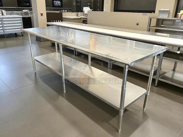 Uline stainless steel worktop table, model H-10348, in perfect condition. Features durable surfaces and lower shelf.