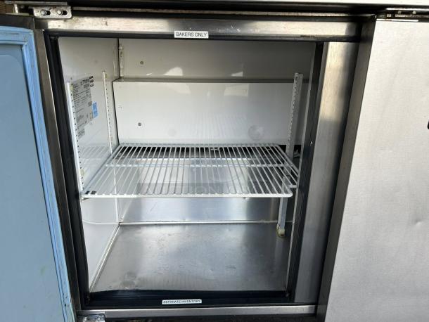 True TWT-72 72 3/8" worktop refrigerator in great condition with 3 9/16" backsplash. Interior shelving and labels visible.