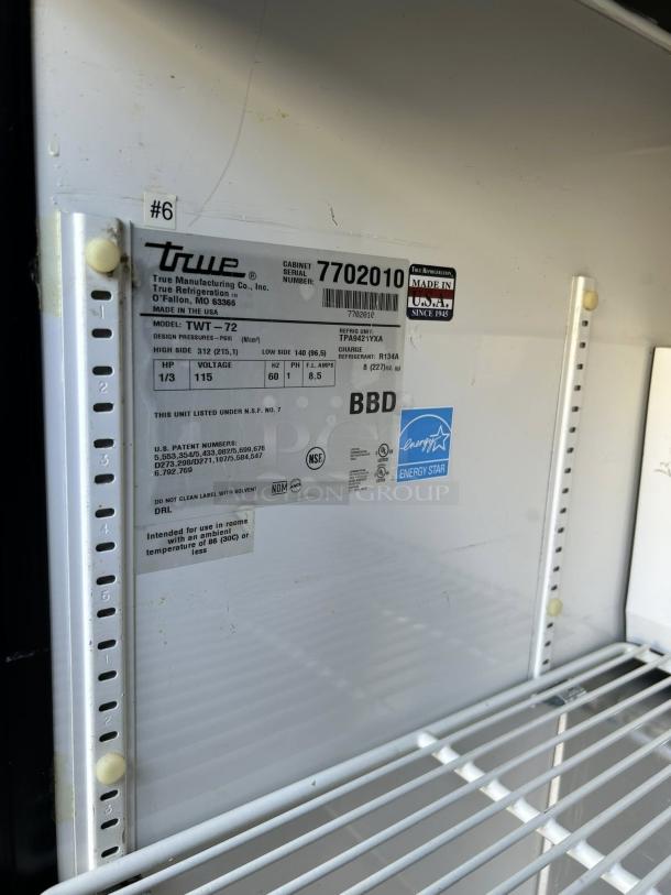 True TWT-72-HC worktop refrigerator, 72 3/8" with 3 9/16" backsplash, white interior, visible model and energy labels, great condition.