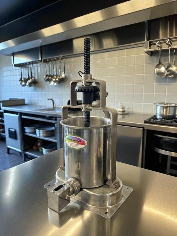 Kabob-O-Matic 13741 sausage stuffer, stainless steel, manual, 7 kg capacity, excellent condition, visible brand label.