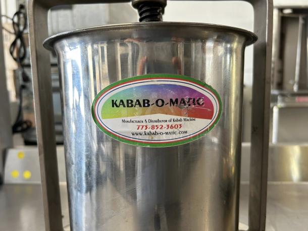 Kabob-O-Matic 13741 sausage stuffer, stainless steel, manual, 7 KG capacity, great condition, logo label visible.