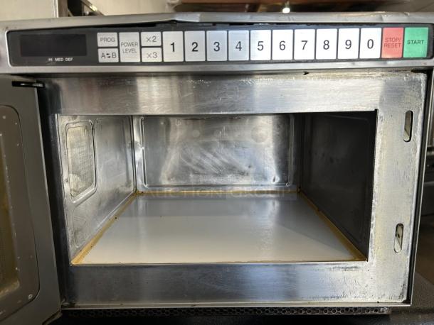 Panasonic NE-17723 1700W commercial microwave oven with 3-stage cooking, shown open. Tested, working, excellent condition.