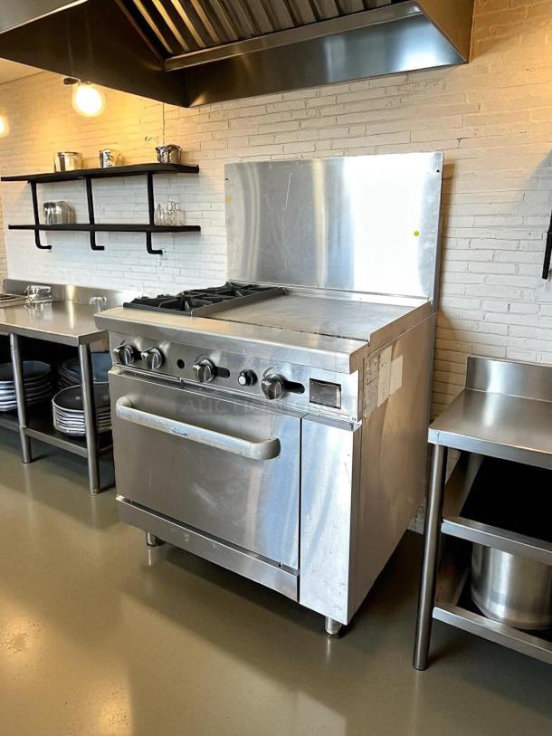 Atosa AGR-2B24GR gas range with 2 burners, 24" griddle, oven, stainless steel, excellent condition, fully tested.