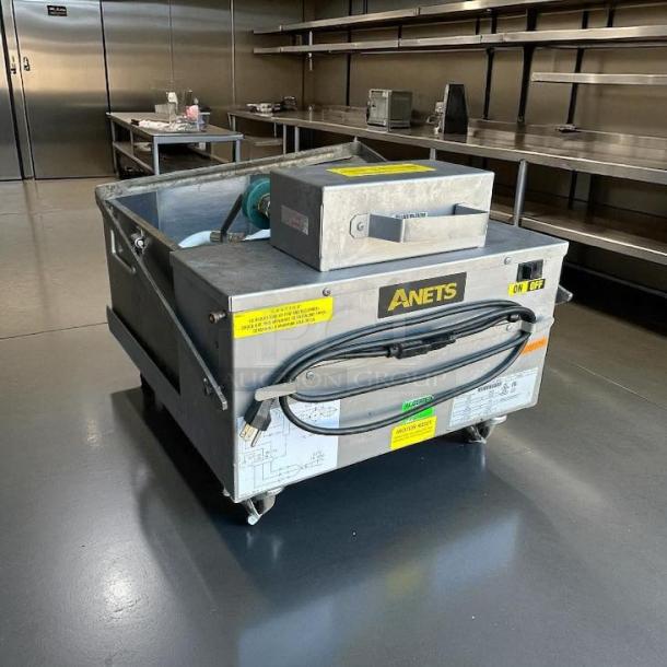 Anets FFM80 80 lb commercial fryer filter, excellent condition, gravity model, 120v, tested and working, visible labels.