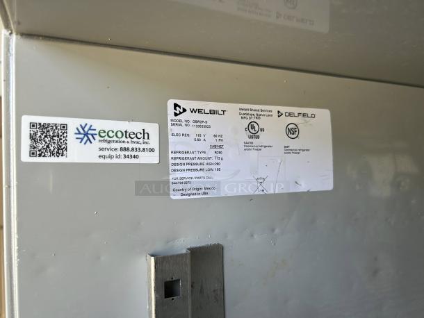 Delfield GBR2P-S 2-Door Commercial Refrigerator tags, showing model, serial number, voltage, and certifications.