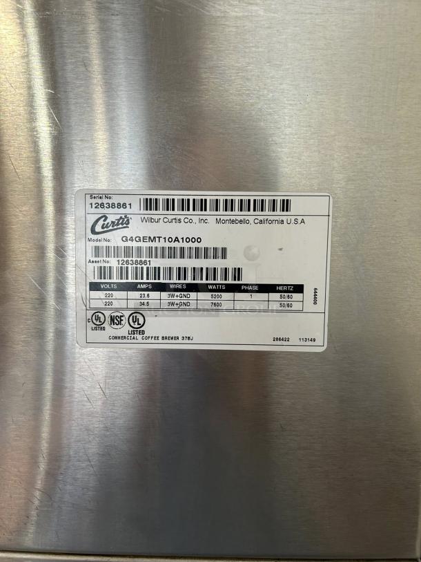Wilbur Curtis G4GEMT10A1000 dual automatic coffee brewer label, 220V, excellent condition, UL listed, serial number 12638861.