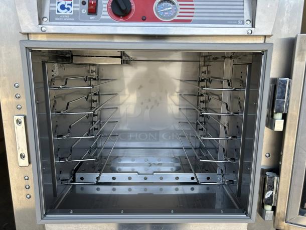 Metro C5 63L-SFC-UA heated holding cabinet in excellent condition, 120V, fully tested. Interior racks visible, front control panel.