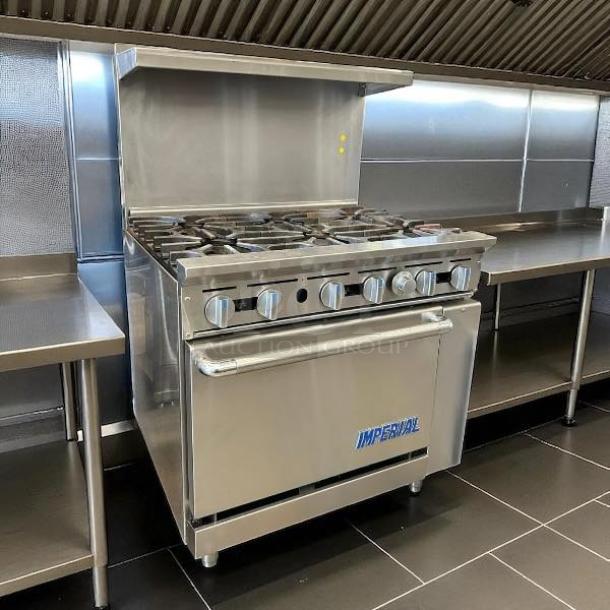 Imperial Range IR-6NG Pro Series 36" natural gas stove, six burners, 26.5” oven, silver, excellent condition, tested.