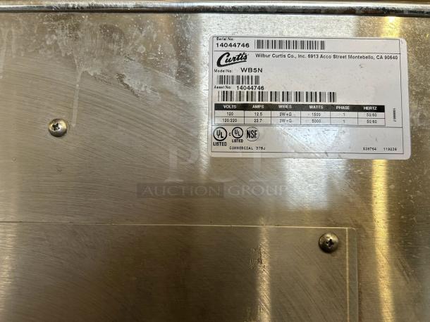 Curtis WB5N G3 5 Gallon Hot Water Dispenser, 120/220V, 1500/5000W. Excellent condition, UL and NSF certified label visible.