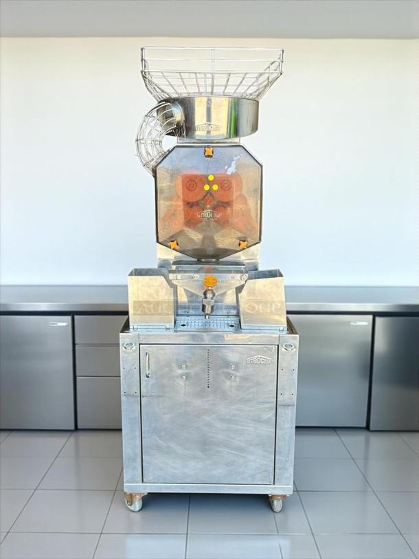 Citrocasa 8000 SB-ATS Advance Citrus Juicer, fully tested and working, stainless steel, large feed hopper, on wheels.