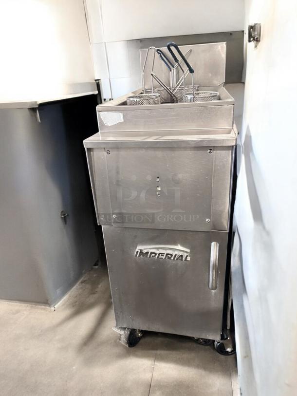 Stainless steel commercial gas fryer with baskets, labeled "Imperial." Model: Pitco VF35, 70,000 BTU, fully operational.