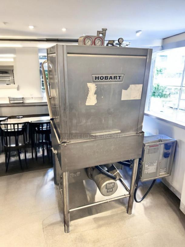 Hobart AM-12 high-temp commercial dishwasher in outstanding condition, 208-230V, fully tested.