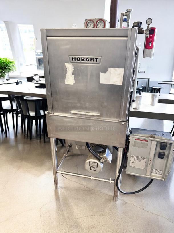 Hobart AM-12 high-temp commercial dishwasher, excellent condition, fully operational, 208-230V, visible gauges and control box.